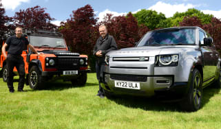Land Rover p400e long term test: Steve Fowler and Jason Holt standing with a classic and new Land Rover Defender